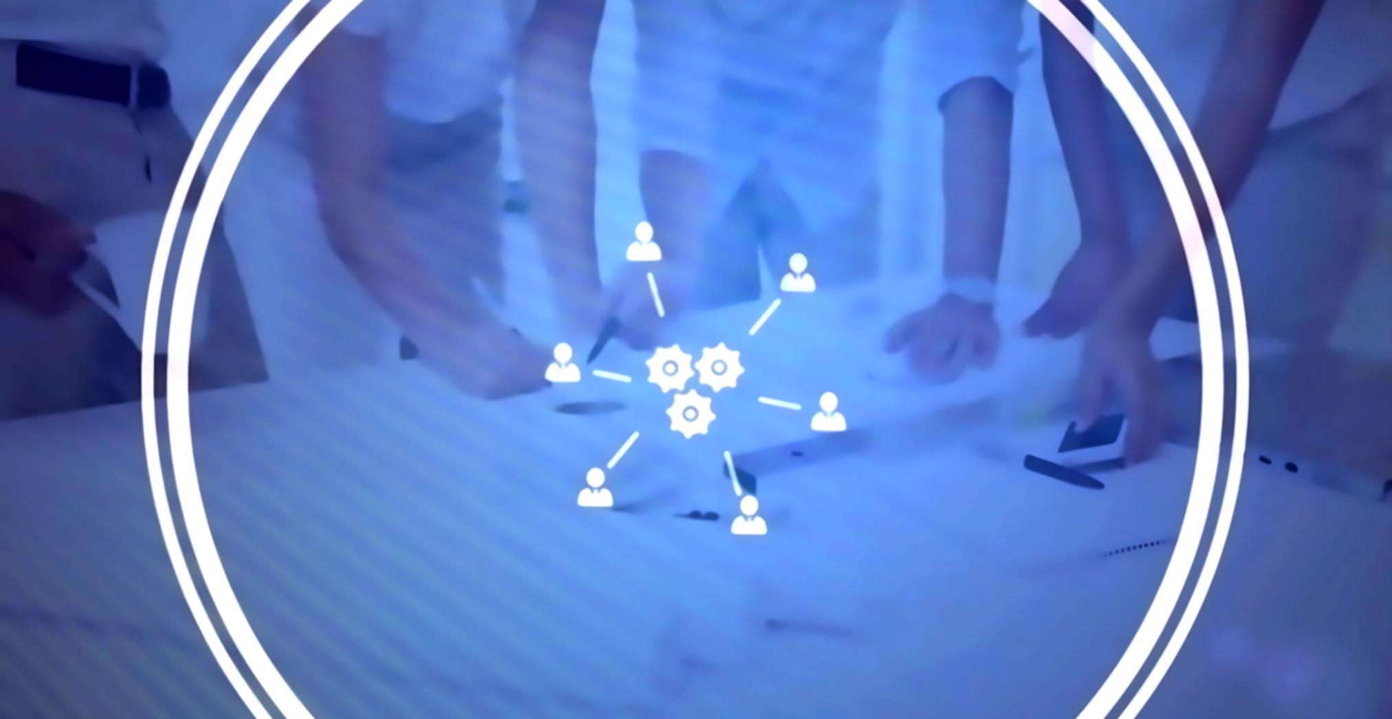 Early blockchain development team collaborating on consortium architecture design