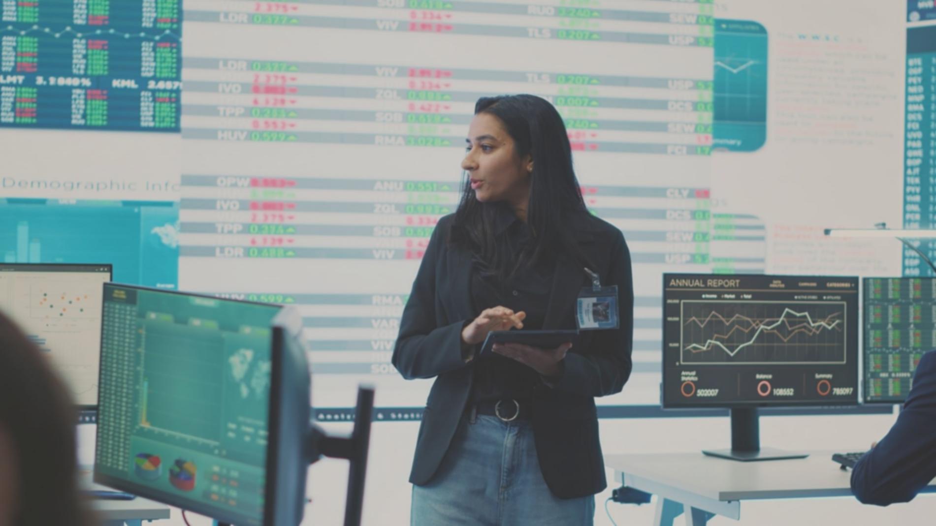 Team meeting discussing consortium blockchain network architecture and security protocols