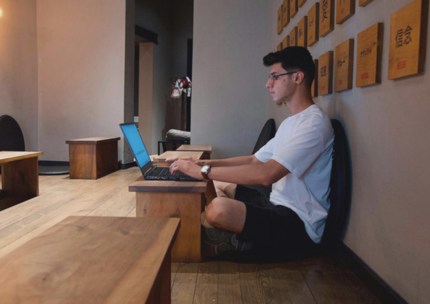 Blockchain developers reviewing smart contract code on multiple screens